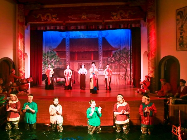 Long Thanh dien xuong ៖ការគួបផ្សំរវាងសិល្បះcheo និងតុក្កតាទឹក